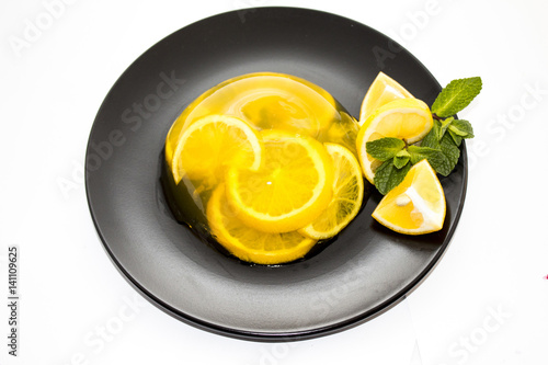 Fotografía Fruit jelly on dark plate