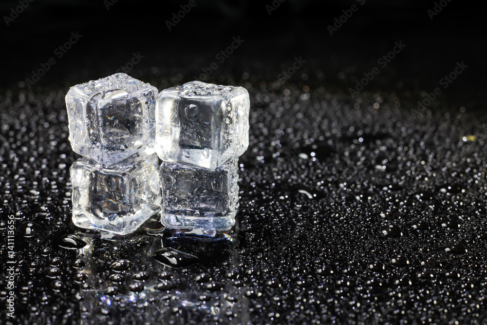 ice cubes on black background. ice cubes on black background.