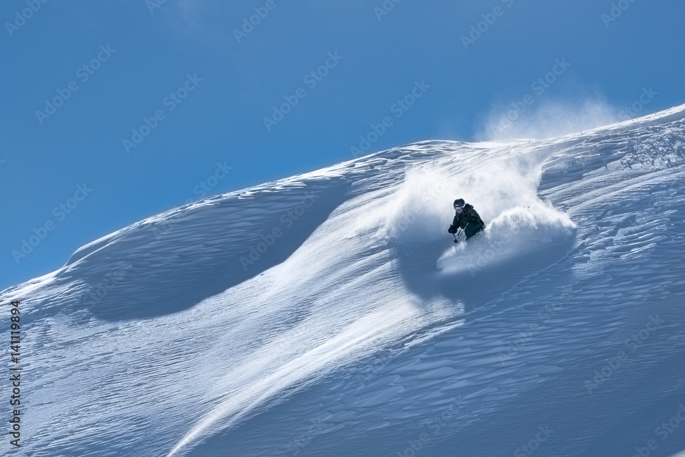 Big mountain powder skiing in the Swiss Alps