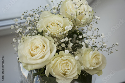 White tender roses in the bouquet