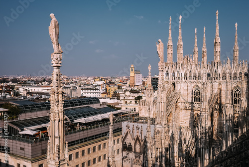 Numerous steeples with statues on Duomo di Milano main Cathedral © Soloviova Liudmyla