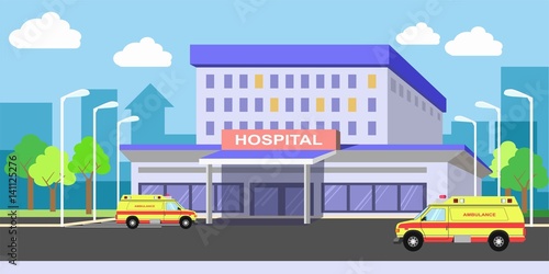 Urban hospital building exterior with ambulances on yard © Sonulkaster