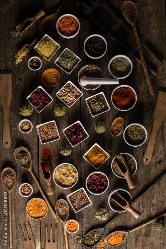 Various of colorful spices on wooden table. place for typography Various of colorful spices on wooden table. place for typography