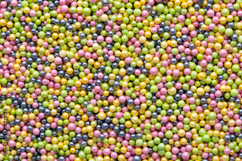 Multicoloured sweet sugar balls. Small ball pattern.