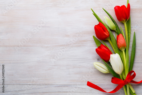 Red tulips  spring flowers and Easter decoration.