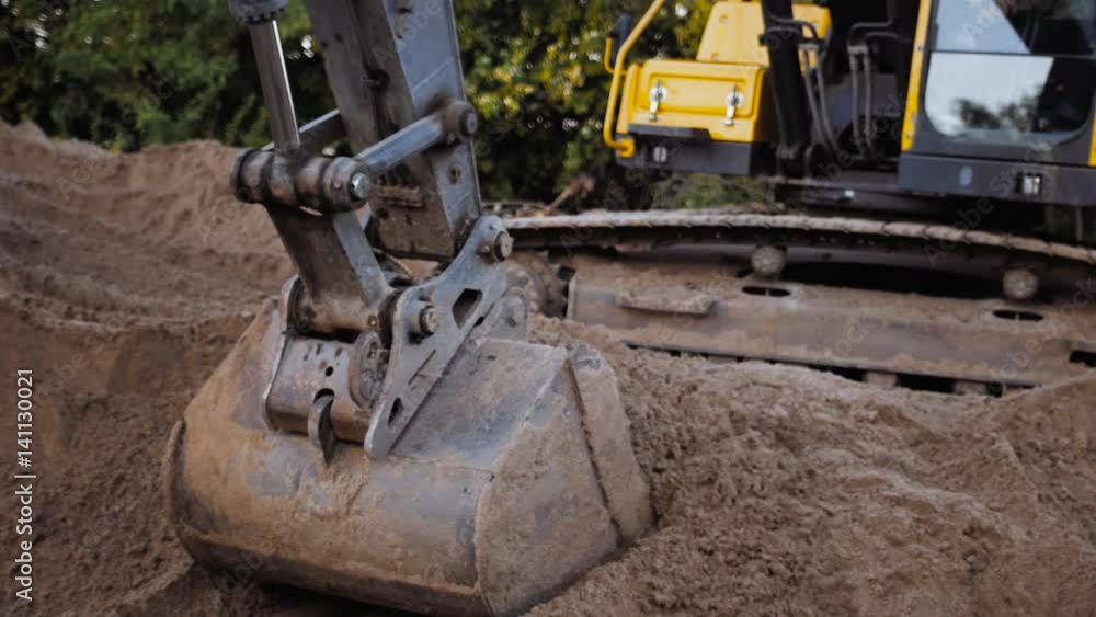 Excavator Digging Sand And Dust Working During Road Works, Close Up Shot of Bucket of a Earth Mover Digging Machine Excavator Digging Sand And Dust Working During Road Works, Close Up Shot of Bucket of a Earth Mover Digging Machine