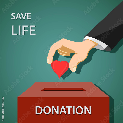 Man puts a red heart in to donation box. Charity and philanthrop