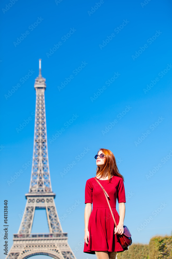 beautiful young woman on the Eiffel Tower background