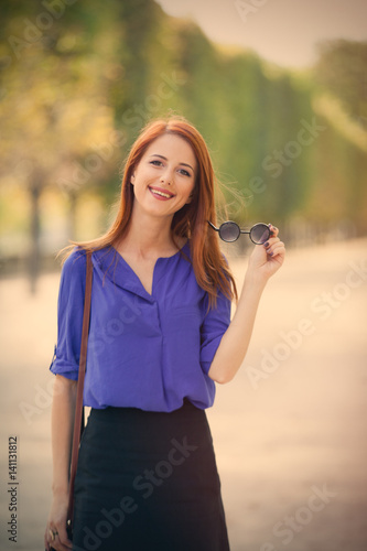 Wallpaper Mural beautiful young woman walking in the park Torontodigital.ca