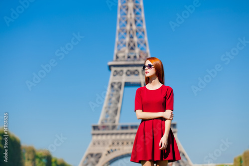 beautiful young woman on the Eiffel Tower background © Masson