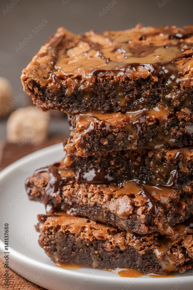 Brownie. Homemade cake with chocolate and caramel. American dessert. Selective focus Brownie. Homemade cake with chocolate and caramel. American dessert. Selective focus