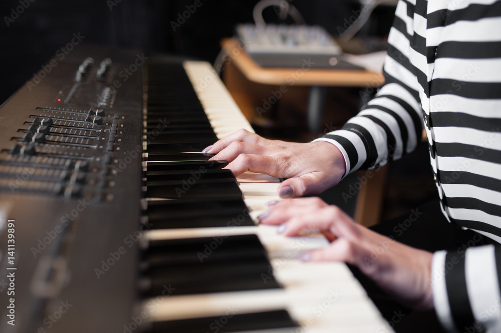 Fototapeta premium Hands music, synthesizer, piano