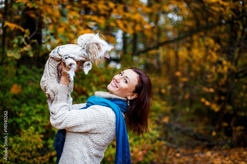 A woman having fun in autumn outdoors