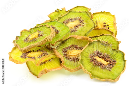 dried slices of kiwi fruits isolated on a white background