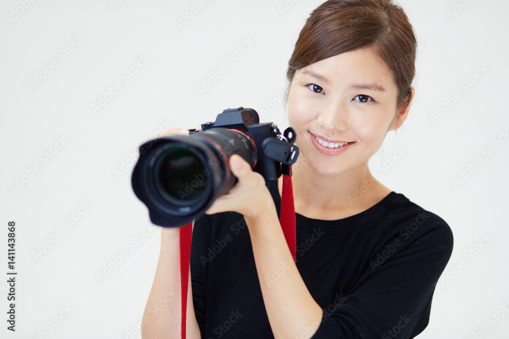 カメラを構える女性 Stock 写真 Adobe Stock
