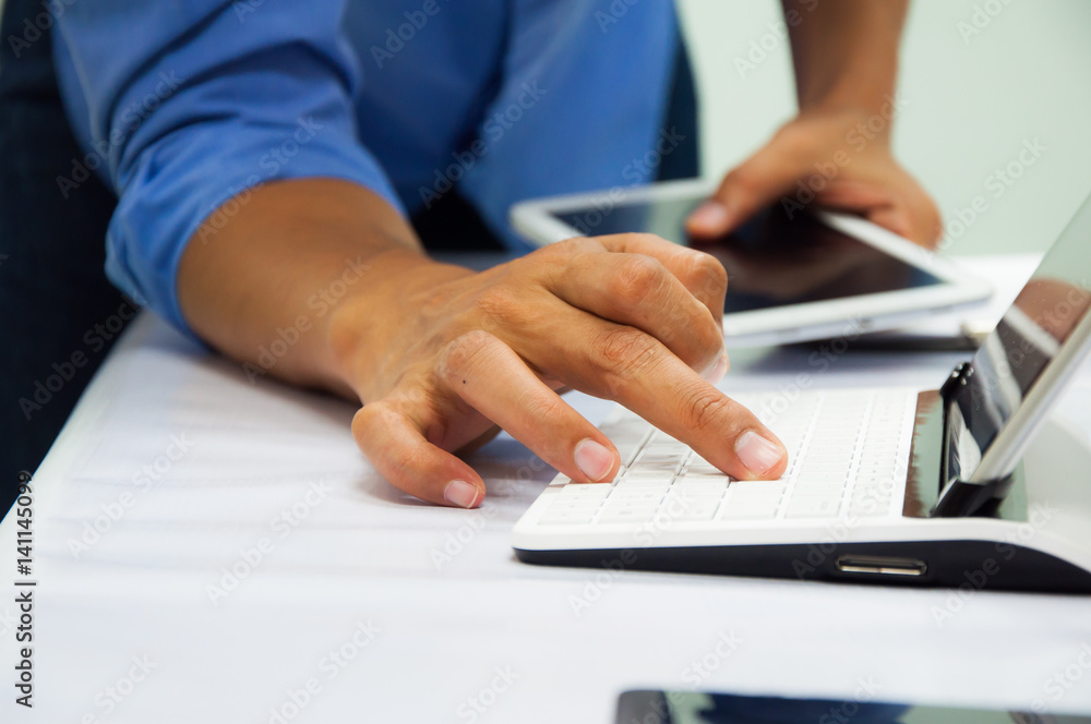 Businessman working at office. Digital tablet laptop computer smart phone using, keyboard. Connection internet application online. Finance manager. Banking. Businessman working at office. Digital tablet laptop computer smart phone using, keyboard. Connection internet application online. Finance manager. Banking.