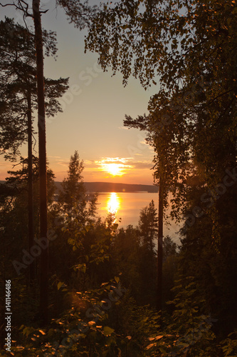 Red sundown over an lake photo