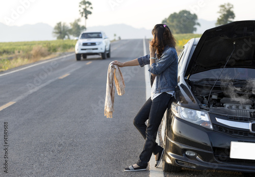 lady call for help of car breakdown
