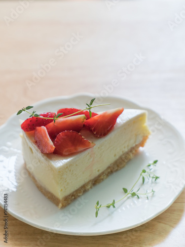 Strawberry cheese cake on wood table,Strawberry cake dessert.