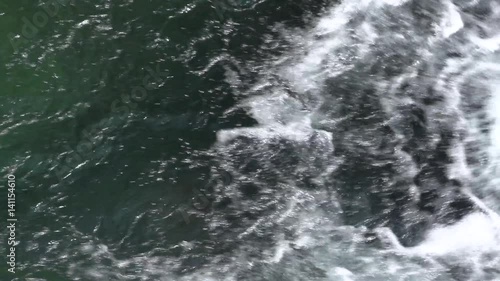 Waterfall on a mountain river flowing into Lake Baikal. Baikal Nature Reserve.