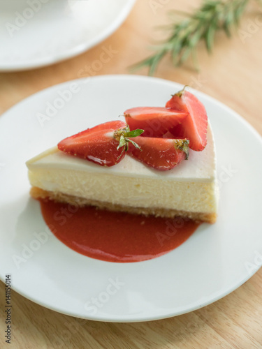 Strawberry cheese cake on wood table,Strawberry cake dessert.