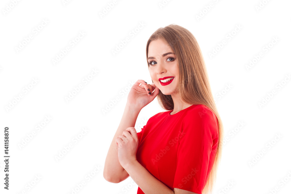 Young stylish and beautiful model girl with red lipstick in a red dress holds a sheet of white paper with free space for an inscription and mobile phone isolate on a white background Young stylish and beautiful model girl with red lipstick in a red dress holds a sheet of white paper with free space for an inscription and mobile phone isolate on a white background