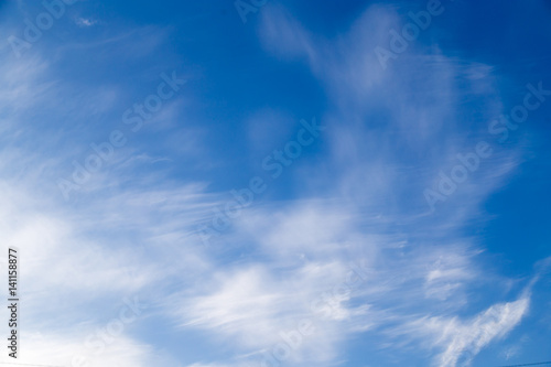 clouds in the blue sky as background