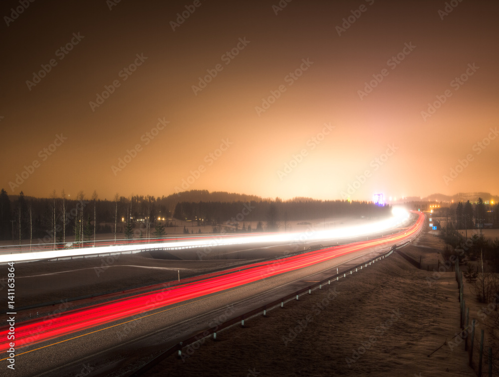 Light rays of cars on a highway Light rays of cars on a highway