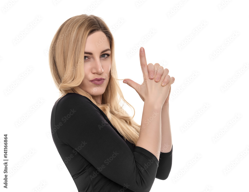 Blonde holds an impromptu pistol in her hands. Blonde holds an impromptu pistol in her hands.