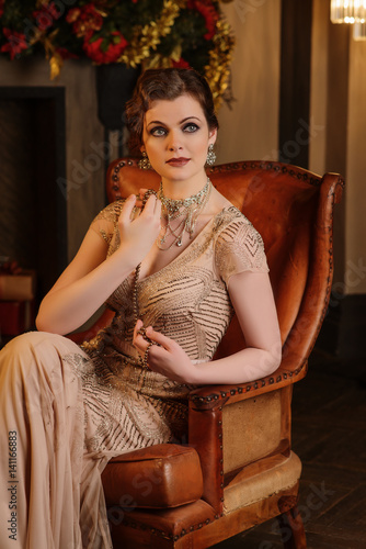Fotografie Portrait of young woman in art-deco style