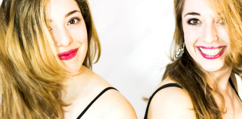 Two beautiful women Portrait over White Background Two beautiful women Portrait over White Background
