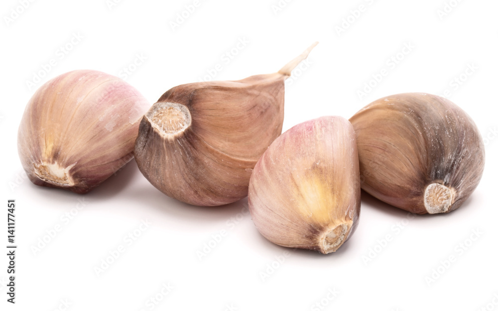 Fototapeta premium garlic cloves isolated on white background cutout