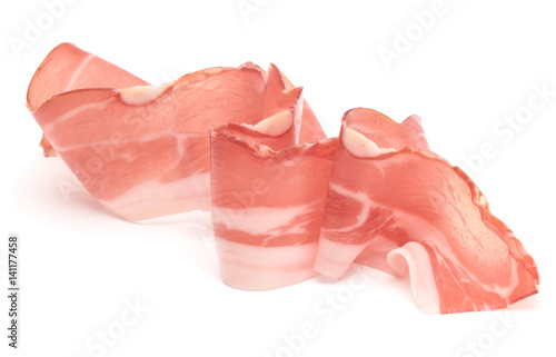 Italian prosciutto crudo or jamon. Raw ham. Isolated on white background