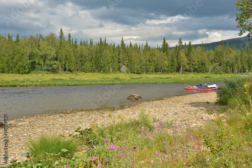 Tourists on the river in the national Park Yugyd VA. photo