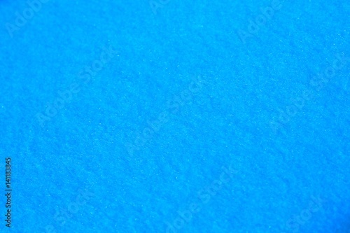 Blue felt pattern for background.