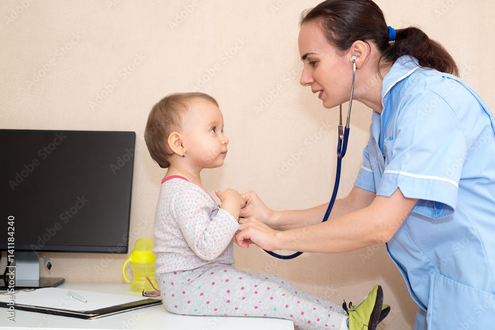 Woman doctor with baby patient Woman doctor with baby patient