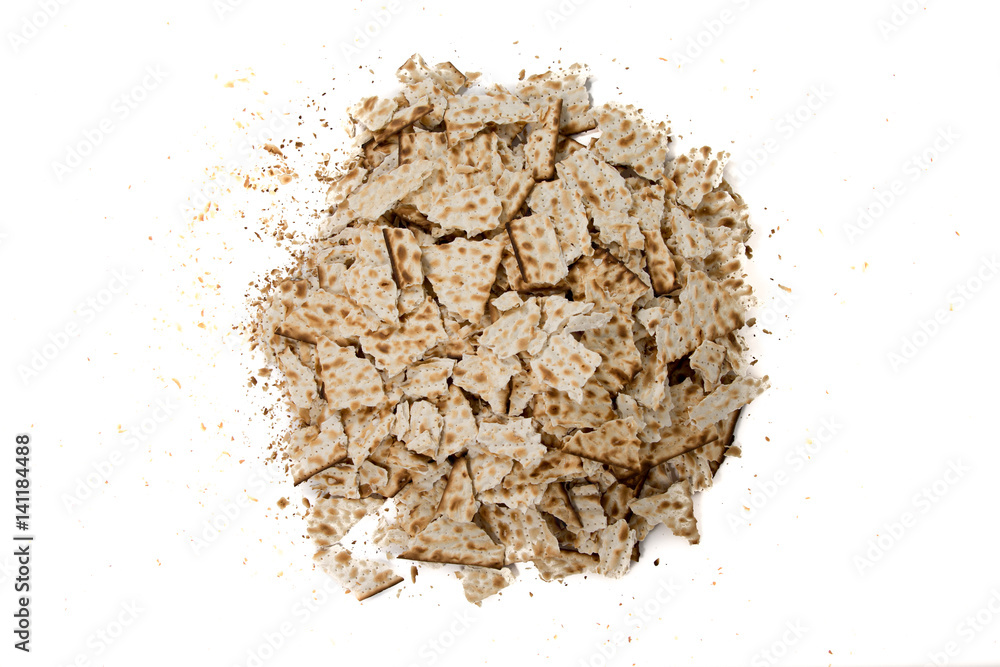 Pieces of broken matza - Top view - Traditional kosher bread for Passover Pieces of broken matza - Top view - Traditional kosher bread for Passover