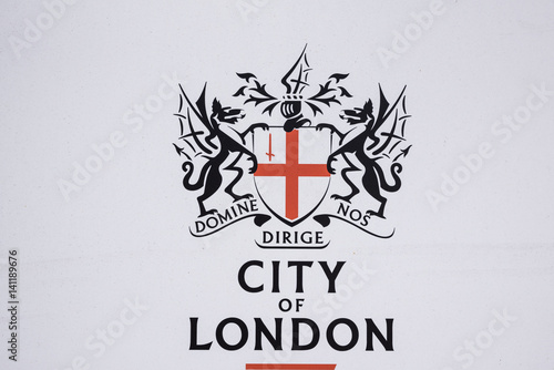 Logo with teo dragons saying "Domine nos Dirige" and City of London
