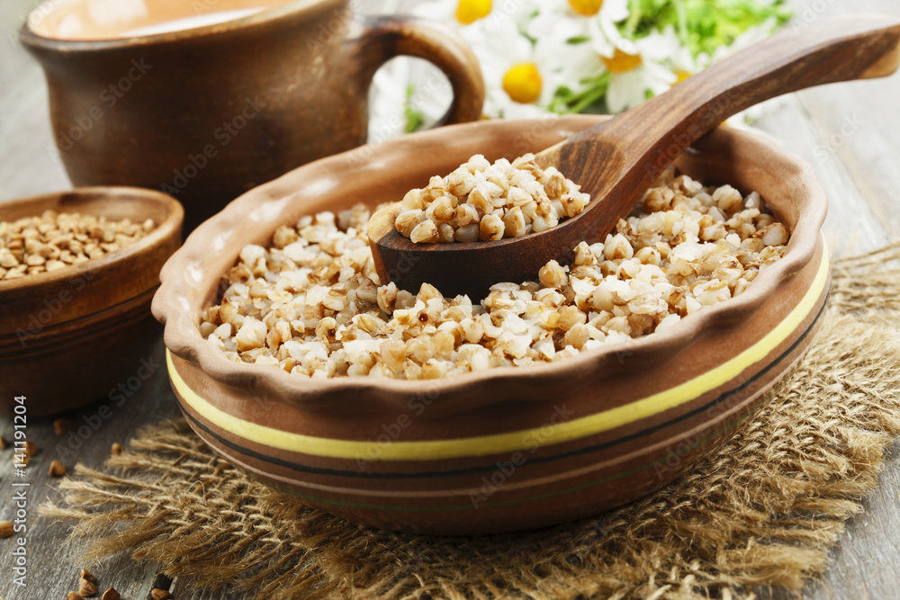 Buckwheat porridge in the ceramic pot Buckwheat porridge in the ceramic pot