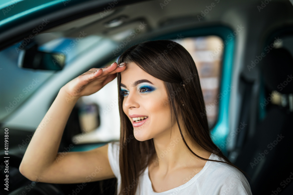 Young woman gesturing while seat in car. looking for. Young woman gesturing while seat in car. looking for.
