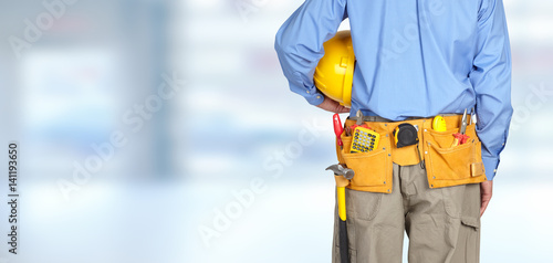 Construction worker with a tool belt.