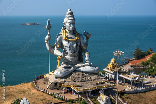 Billede på lærred Hindu god statue, lord Shiva sculpture sitting in meditation India, 2011
