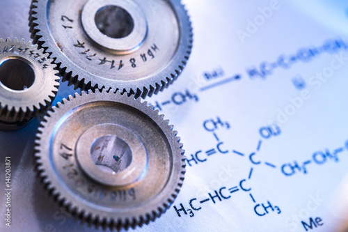 Chemicals reaction formula and mechanical ratchets photo