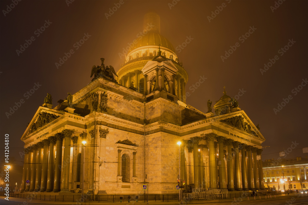 St. Isaac's Cathedral in a mystical fog on the March night. Saint-Petersburg, Russia