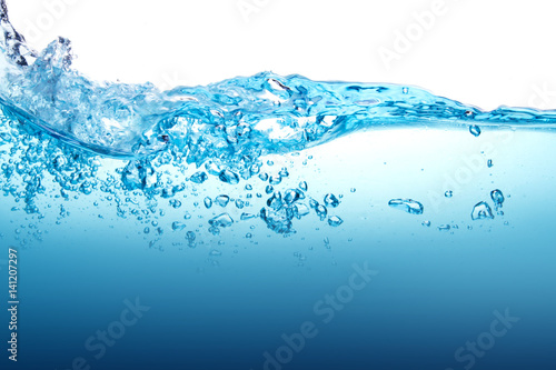 Close up blue Water splash with bubbles on white background photo