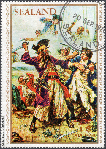 UKRAINE - CIRCA 2017: A stamp printed by Sealand, shows pirate Edward Teach Blackbeard, pirate attack, circa 1970