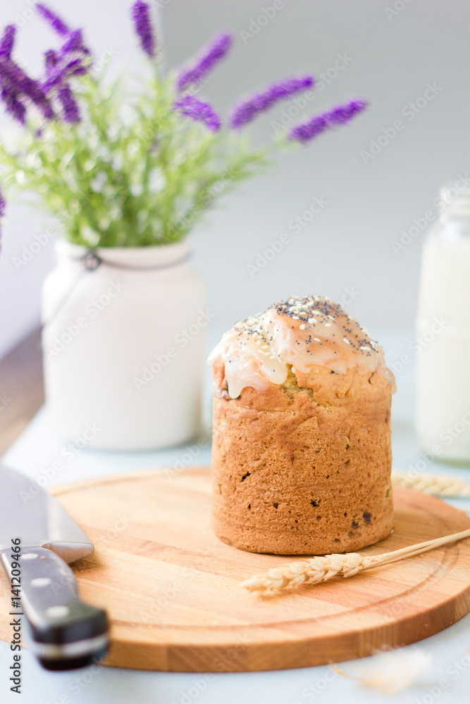 Easter cake standing on easter table, served by easter eggs milk and flowers. Easter cake standing on easter table, served by easter eggs milk and flowers.