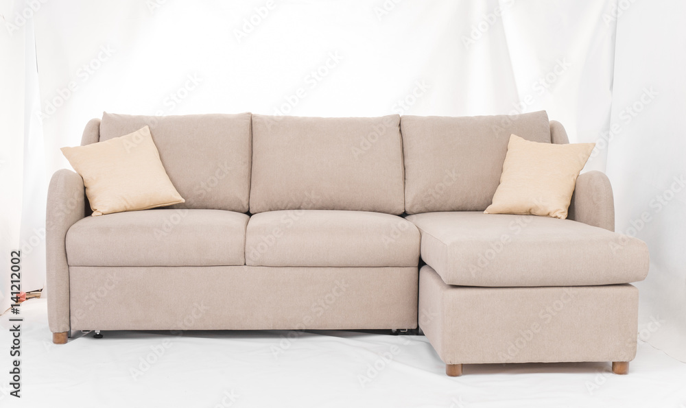 Fototapeta premium Studio shot of a grey modern sofa isolated on white background