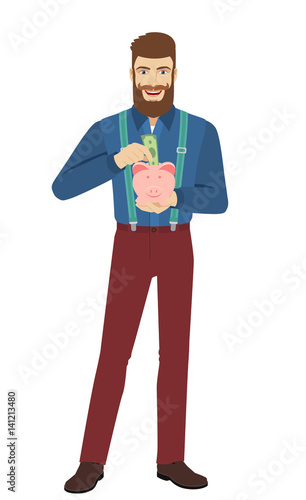 Hipster puts banknote in a piggy bank