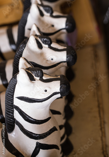 Statue of Zebra in a Row